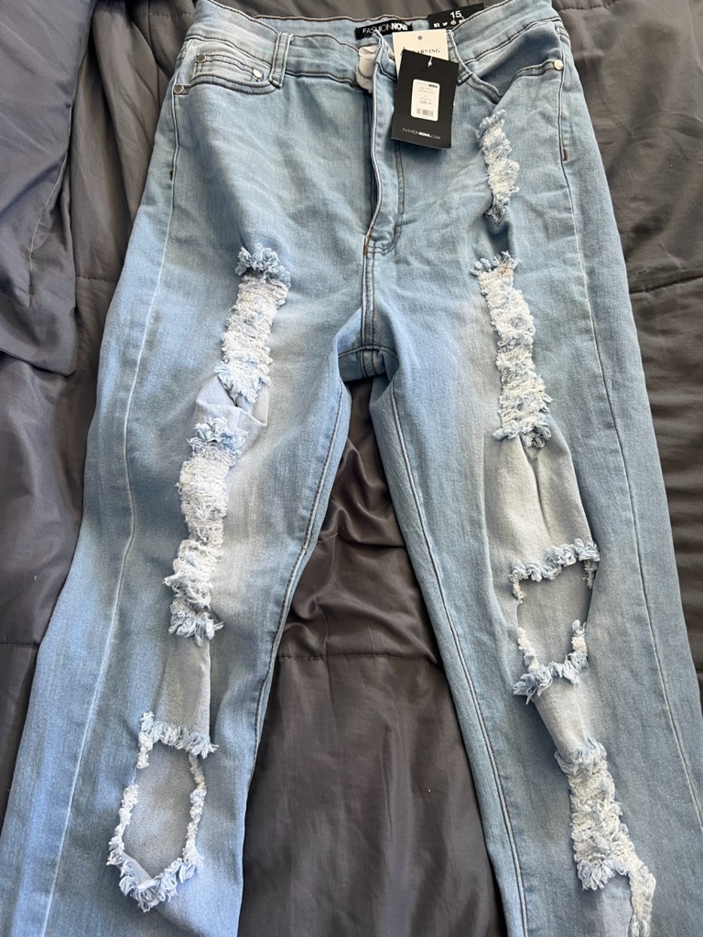 Fashion Nova Light Blue Distressed Skinny Jeans